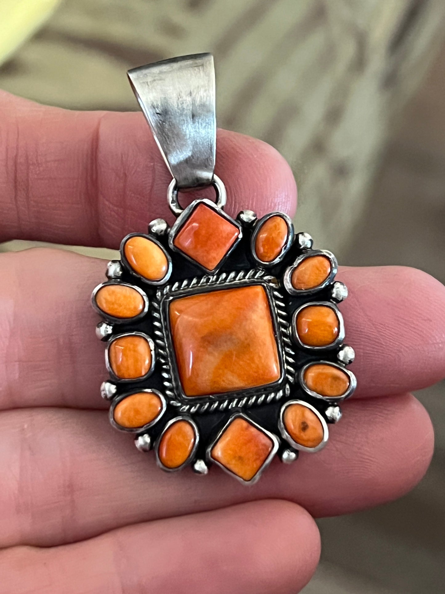 Navajo Sterling Silver and Burnt Spiny Oyster Shell Cluster Pendants by Loretta Delgarito