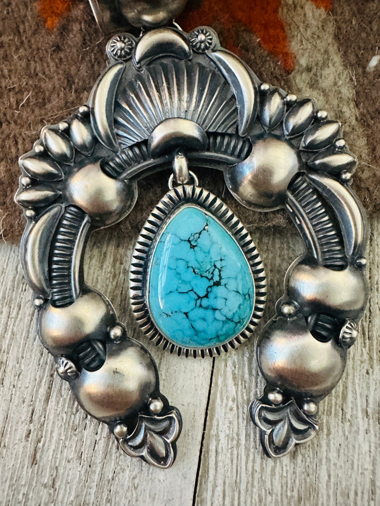 Navajo Sterling Silver & Turquoise Naja Pendant by Delbert Gordon