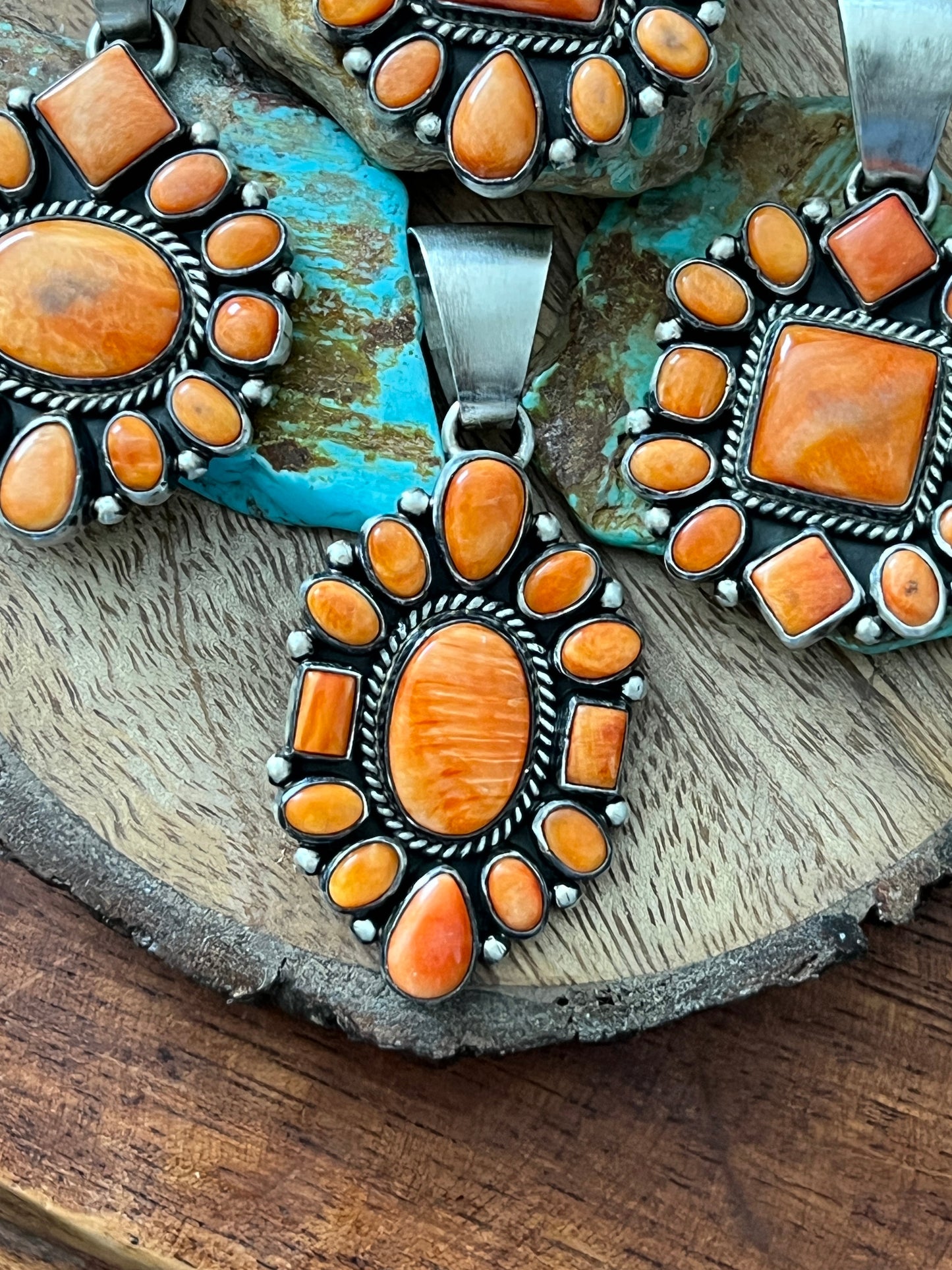 Navajo Sterling Silver and Burnt Spiny Oyster Shell Cluster Pendants by Loretta Delgarito