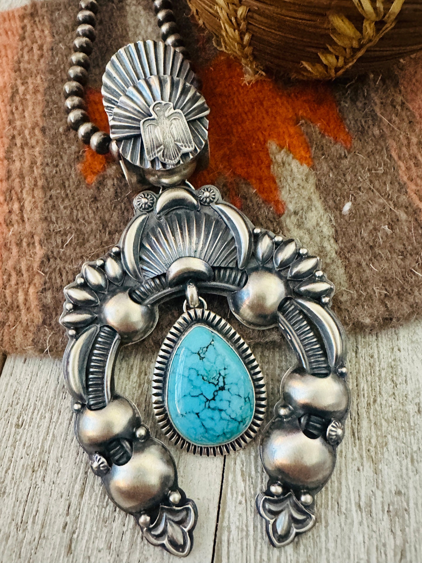 Navajo Sterling Silver & Turquoise Naja Pendant by Delbert Gordon