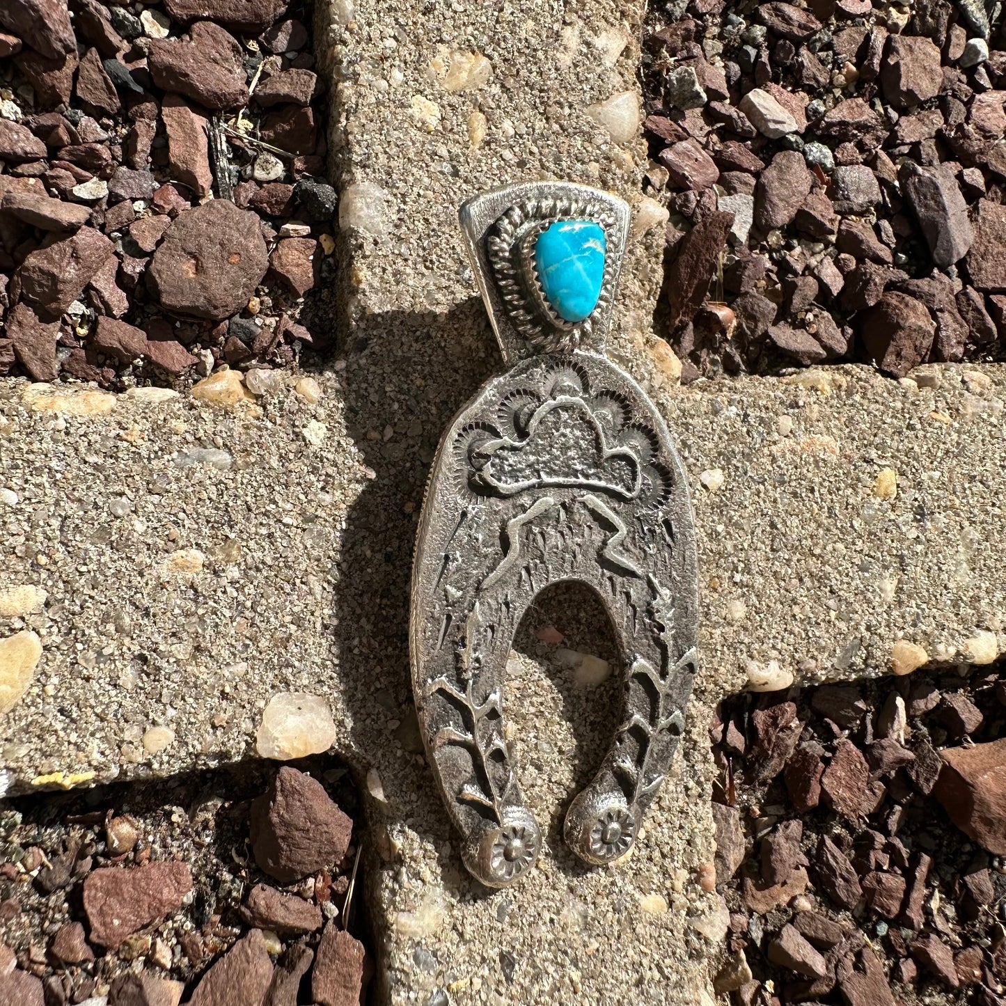 Navajo Made Tufa Cast Sterling Silver and Turquoise Naja Pendant by Delbert Arviso