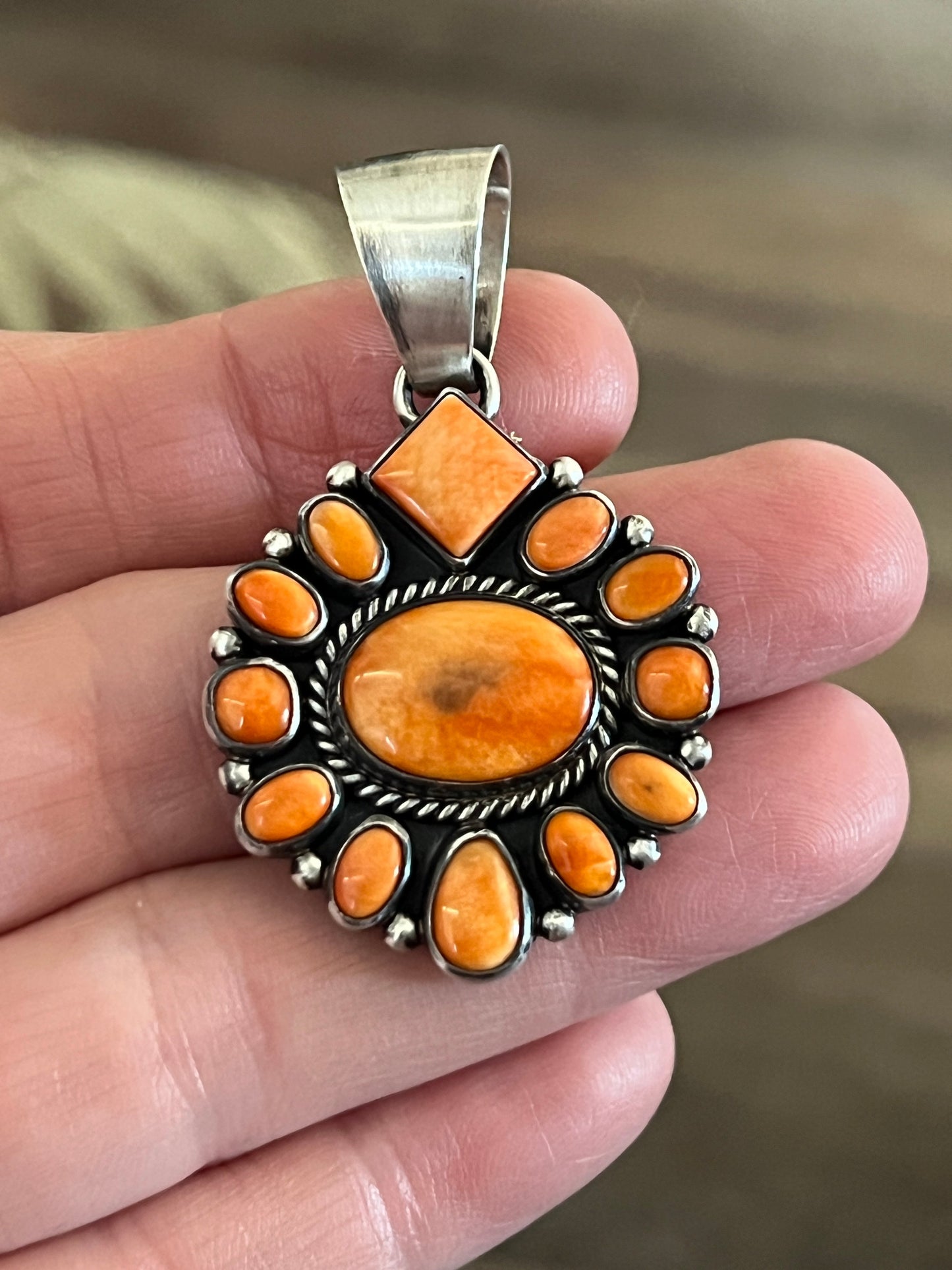 Navajo Sterling Silver and Burnt Spiny Oyster Shell Cluster Pendants by Loretta Delgarito