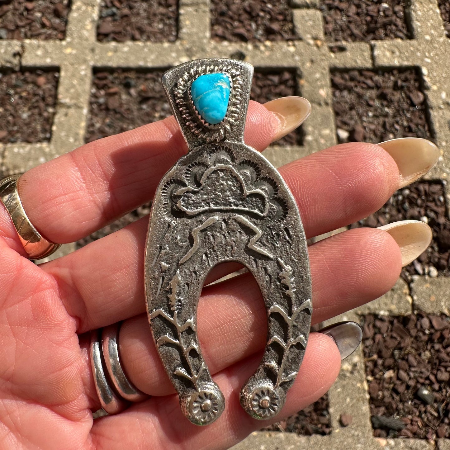 Navajo Made Tufa Cast Sterling Silver and Turquoise Naja Pendant by Delbert Arviso