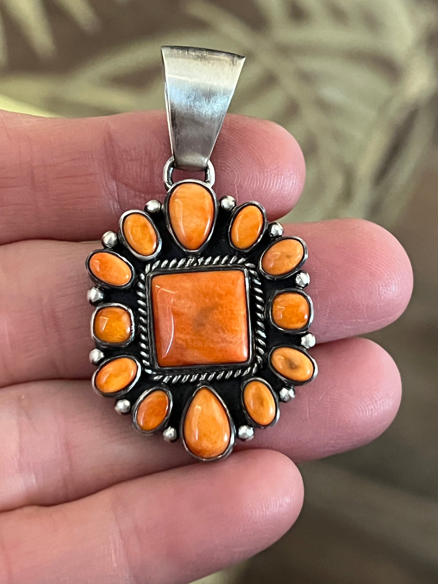 Navajo Sterling Silver and Burnt Spiny Oyster Shell Cluster Pendants by Loretta Delgarito