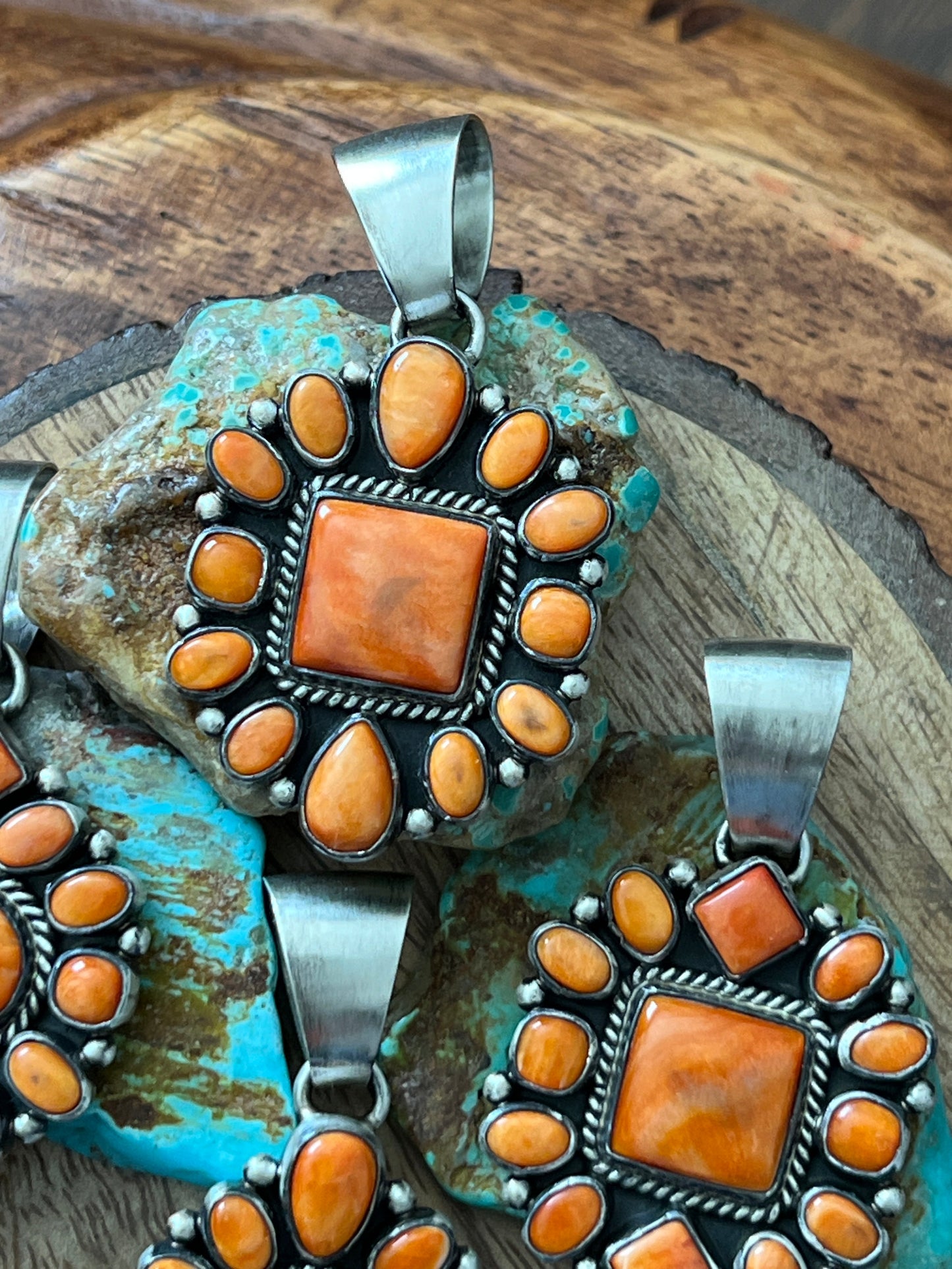 Navajo Sterling Silver and Burnt Spiny Oyster Shell Cluster Pendants by Loretta Delgarito