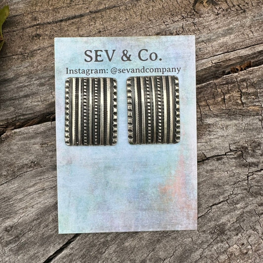 Native Made Sterling Silver Tufa Cast Rectangular Earrings by Harrison Jim