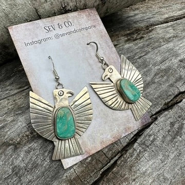 Native Made Sterling Silver and Oval Turquoise Thunderbird Earrings by Vernon Begay