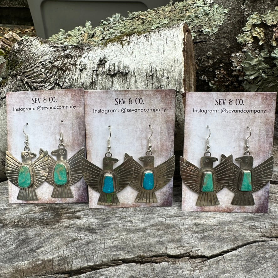Native Made Sterling Silver and Oval Turquoise Thunderbird Earrings by Vernon Begay