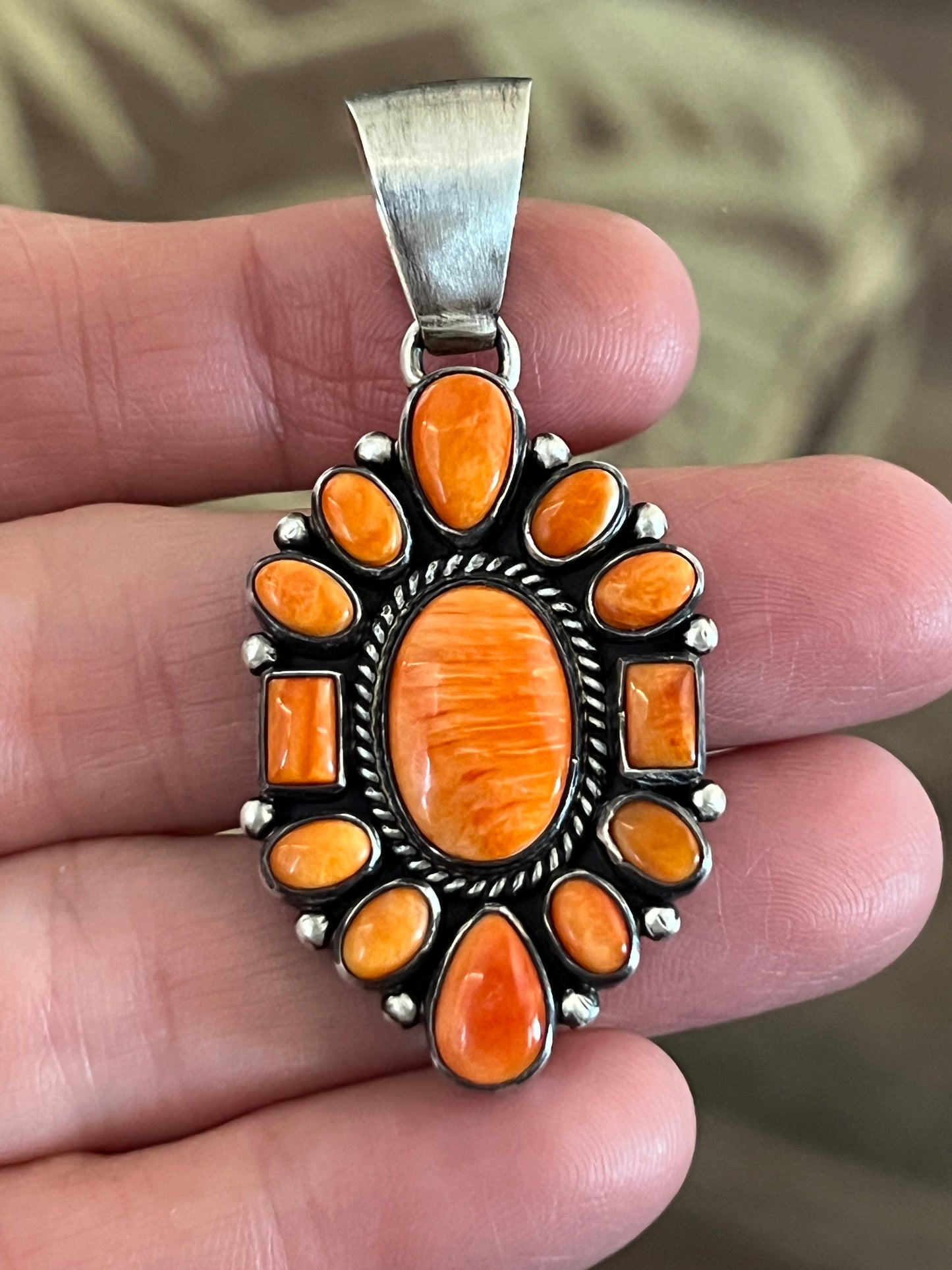 Navajo Sterling Silver and Burnt Spiny Oyster Shell Cluster Pendants by Loretta Delgarito