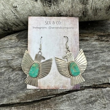 Native Made Sterling Silver and Oval Turquoise Thunderbird Earrings by Vernon Begay