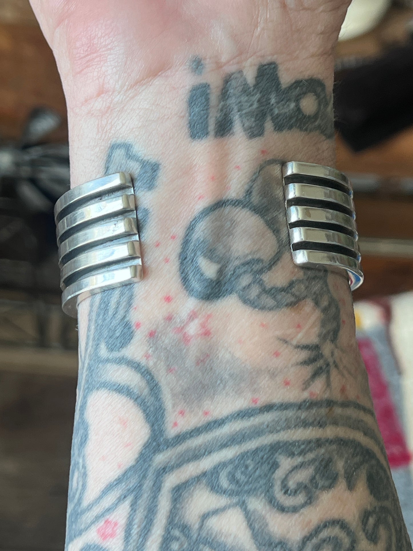Hefty Sterling Silver and Sugilite Cuff Bracelet by Navajo Artist, Alfred Lee Sr.