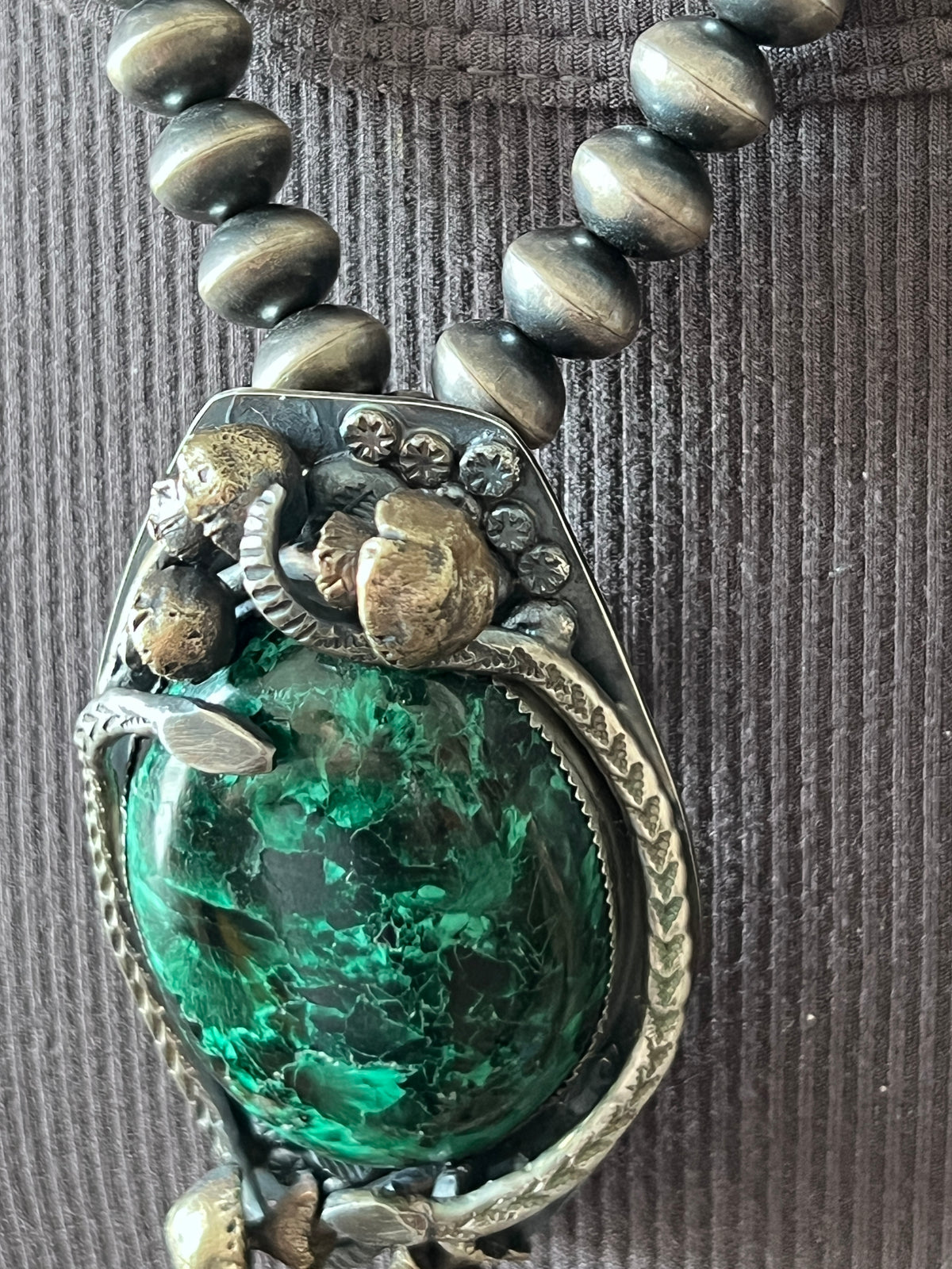Sterling Silver, Brass and Malachite Garden Rattlesnake Pendant by Isaac Baca