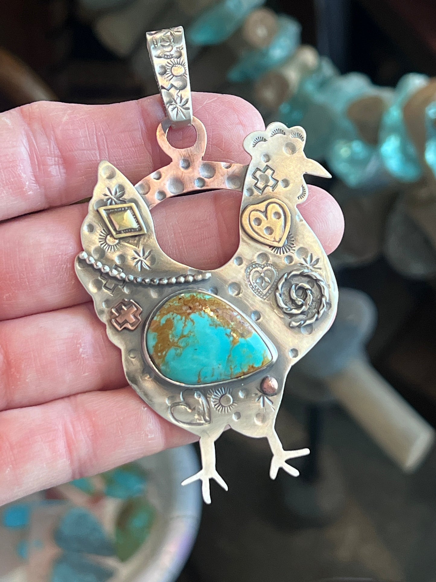 The Nizhoni Cluckers: Hand Stamped and Layered Sterling Silver, Brass, Copper & Kingman Turquoise Chicken Pendants by Kimari Somers