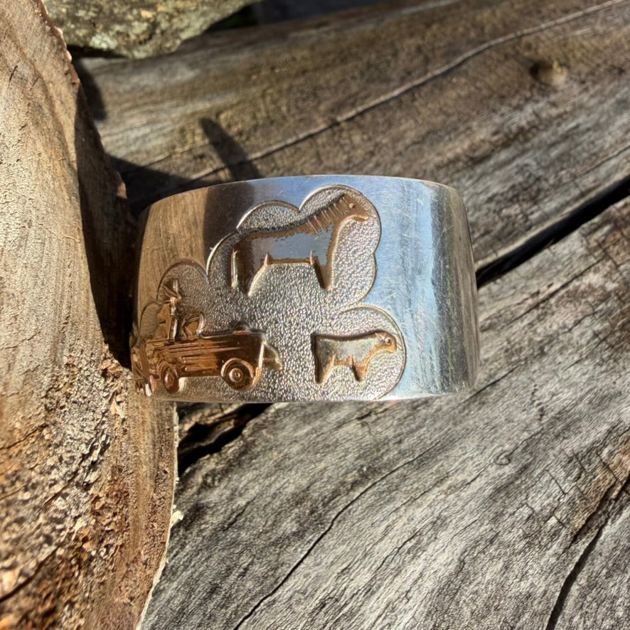 Apache Richard Reeve Sterling Silver with Gold Overlay Storyteller Cuff Bracelet