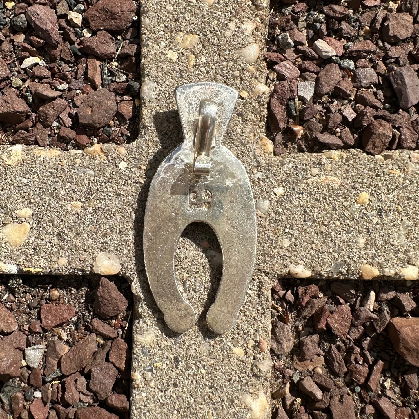 Navajo Made Tufa Cast Sterling Silver and Turquoise Naja Pendant by Delbert Arviso