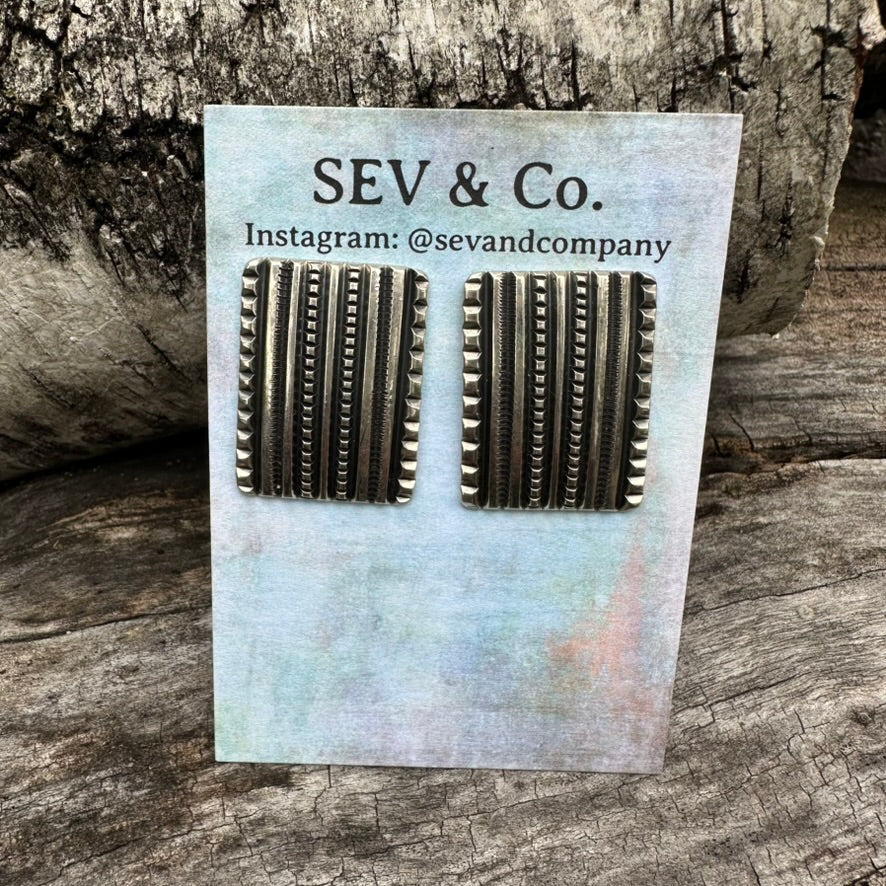 Native Made Sterling Silver Tufa Cast Rectangular Earrings by Harrison Jim