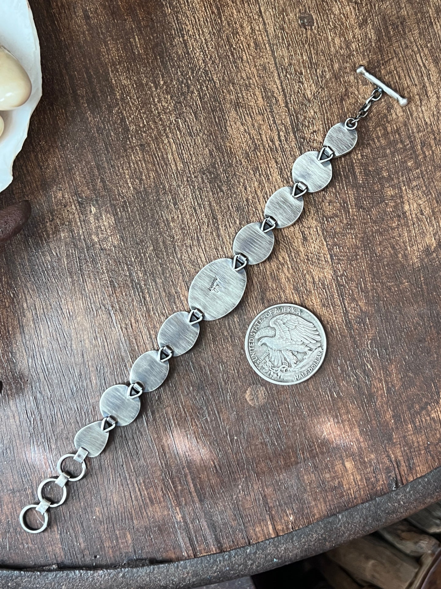Loretta Delgarito Sterling Silver Electric Rainbow Link Turquoise and Spiny Oyster Bracelet: Ovals, Circles and Pears