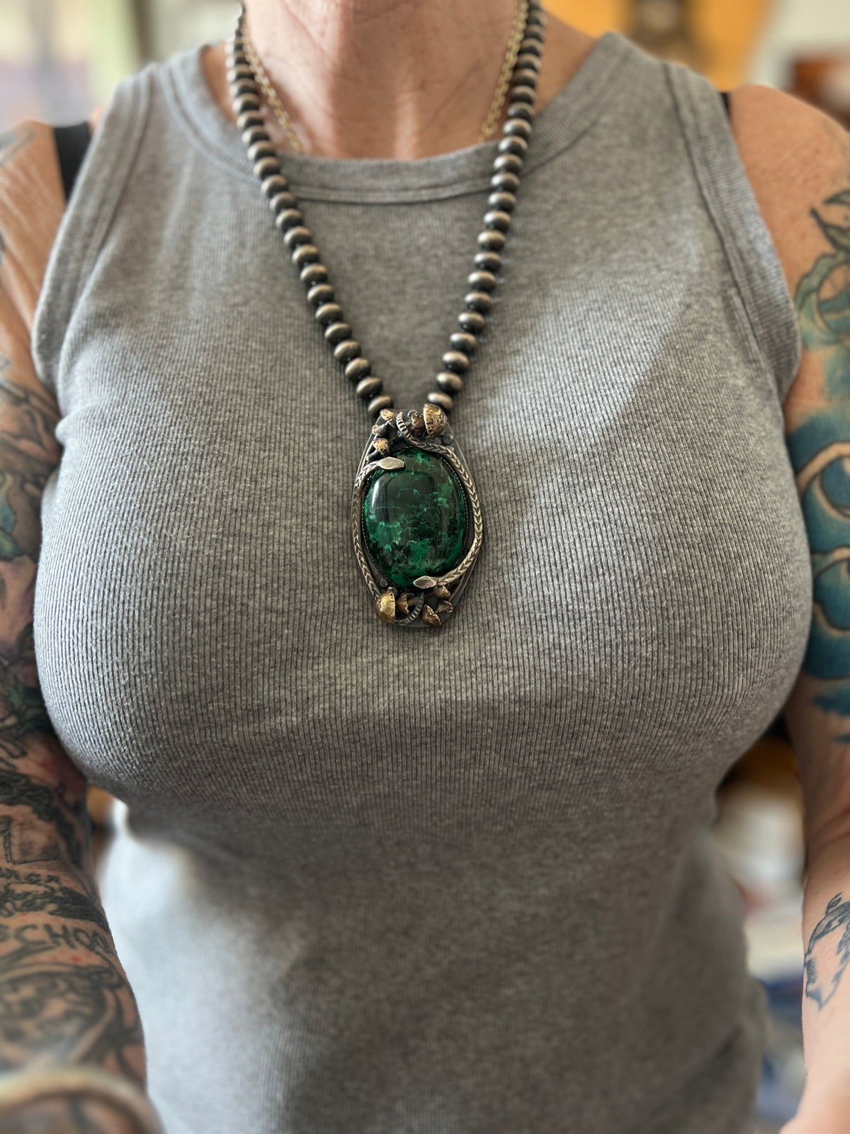 Sterling Silver, Brass and Malachite Garden Rattlesnake Pendant by Isaac Baca