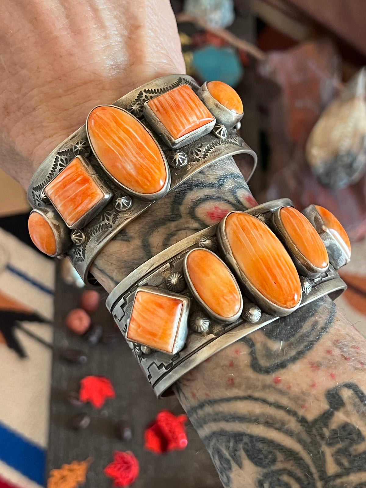 Hand Stamped Sterling Silver and Spiny Oyster Cuff Bracelets by Randall Endito