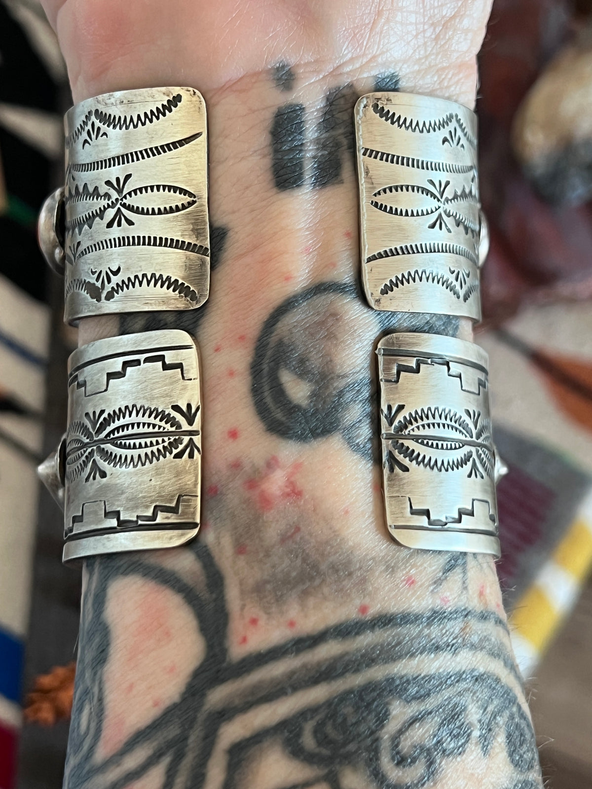 Hand Stamped Sterling Silver and Spiny Oyster Cuff Bracelets by Randall Endito