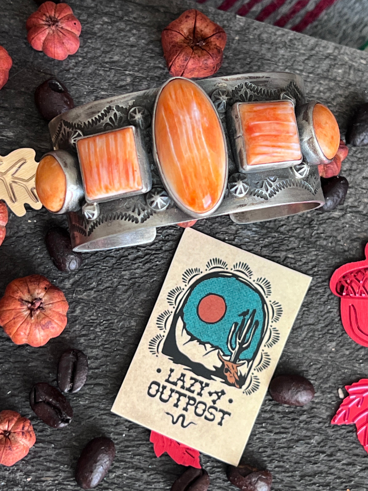 Hand Stamped Sterling Silver and Spiny Oyster Cuff Bracelets by Randall Endito