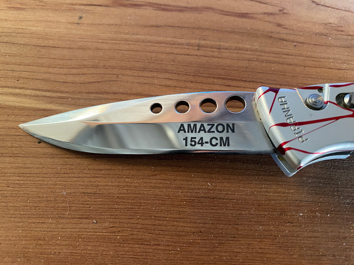 Piranha Amazon  Automatic pocket knife